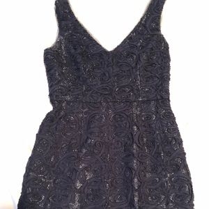 BCBG Maxazria size 4 dress. Navy and shimmers wife texture. Gently worn.